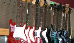 Guitars and other musical instruments at Top Cash Pawn and Loan